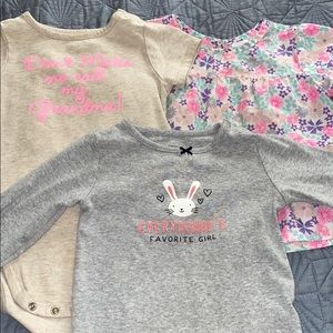 Onesies, tops and a dress. Sizes 18-24 months.